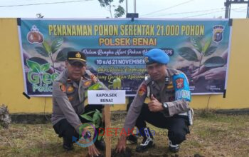 Menanam Harapan di Bumi Pacu Jalur: Kapolsek Ipda Hainur Rasyid dan Warga Bergerak Hijaukan Kuansing