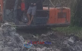 Excavator Diduga Milik Rido Alias Tardo Garap PETI di TPA Sentajo—APH Diminta Buktikan Ketegasan Jangan Sampai Timbulkan Persepsi Pembiaran