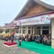 Unik! Di Kuantan Hilir Pria Bawa Baki — Dua Perempuan Kibarkan Merah Putih di HUT Kuansing ke-27